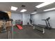 Well-equipped fitness center with treadmills, weights, and machines at 90 S Highland Ave # 1115, Tarpon Springs, FL 34689