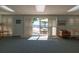 Bright common room with access to a deck overlooking the water at 90 S Highland Ave # 1115, Tarpon Springs, FL 34689