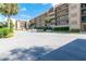 Building with parking lot and landscaped area at 90 S Highland Ave # 1115, Tarpon Springs, FL 34689
