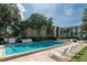 Cool off in this inviting community pool with plenty of lounge chairs at 90 S Highland Ave # 1115, Tarpon Springs, FL 34689