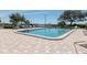This community pool provides a relaxing escape with plenty of lounge chairs at 90 S Highland Ave # 1115, Tarpon Springs, FL 34689