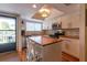 Bright kitchen with wood countertops, stainless steel appliances, and an island at 90 S Highland Ave # 1115, Tarpon Springs, FL 34689