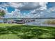 Full boat dock with many boats and access to the lake at 90 S Highland Ave # 1115, Tarpon Springs, FL 34689