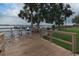 Relaxing dockside area with picnic tables and beautiful lake views at 90 S Highland Ave # 1115, Tarpon Springs, FL 34689