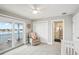 Bedroom with water views, private balcony access, and en-suite bathroom at 339 55Th Ave, St Pete Beach, FL 33706