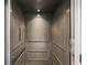 Interior view of an elegant home elevator at 339 55Th Ave, St Pete Beach, FL 33706