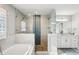 Spa-like bathroom featuring a large walk-in shower and soaking tub at 339 55Th Ave, St Pete Beach, FL 33706