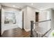 Upstairs hallway with access to bedrooms and elevator at 339 55Th Ave, St Pete Beach, FL 33706