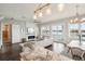 Living room with water views, fireplace, and hardwood floors at 339 55Th Ave, St Pete Beach, FL 33706