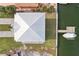 Top-down view of house, showing metal roof and adjacent dock at 339 55Th Ave, St Pete Beach, FL 33706