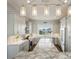Modern kitchen with large island and stainless steel appliances at 339 55Th Ave, St Pete Beach, FL 33706