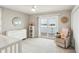 Bedroom with water view, a recliner, and a white dresser at 339 55Th Ave, St Pete Beach, FL 33706