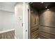 Modern elevator with wood paneling, conveniently located inside the home at 339 55Th Ave, St Pete Beach, FL 33706