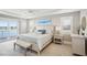 Spacious main bedroom with water views and private balcony at 339 55Th Ave, St Pete Beach, FL 33706