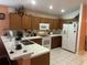 Well-equipped kitchen featuring ample cabinetry and modern appliances at 6812 Aramon Ct, Wesley Chapel, FL 33545