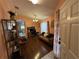 Living room with a home office and hardwood floors at 6812 Aramon Ct, Wesley Chapel, FL 33545