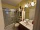 Bathroom with tub, shower, and double vanity at 6812 Aramon Ct, Wesley Chapel, FL 33545