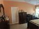 Main bedroom with double dresser and closet at 6812 Aramon Ct, Wesley Chapel, FL 33545