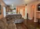 Living room with hardwood floors and built-in shelving at 6812 Aramon Ct, Wesley Chapel, FL 33545