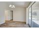 Spacious dining room with wood-look flooring and lots of natural light at 3776 Junction St, North Port, FL 34288