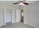 Bedroom with tile flooring and a spacious closet at 3776 Junction St, North Port, FL 34288