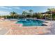 Resort-style pool with multiple seating areas and shade structures at 4309 Bayside Village Dr # 101, Tampa, FL 33615