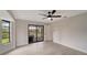 Bright bedroom with sliding glass doors to a patio at 4501 Harrington St, Port Charlotte, FL 33948