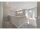 Upstairs hallway with carpeted floors at 21212 Ski Way, Land O Lakes, FL 34638