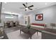 Spacious living room with dining area and modern furniture at 8448 Red Roe Dr, New Port Richey, FL 34653