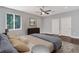 Main bedroom with king-size bed and ample closet space at 8448 Red Roe Dr, New Port Richey, FL 34653
