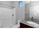 Bathroom with walk-in shower and granite vanity at 8448 Red Roe Dr, New Port Richey, FL 34653