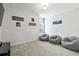 Fun game room with beanbag chairs, TV, and game-themed decor at 8414 Dunham Station Dr, Tampa, FL 33647