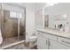 Modern bathroom with shower and granite vanity at 8414 Dunham Station Dr, Tampa, FL 33647
