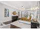 Bright main bedroom with dark hardwood floors and ensuite bathroom at 8414 Dunham Station Dr, Tampa, FL 33647