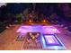 Aerial view of a large pool with a spa at 8414 Dunham Station Dr, Tampa, FL 33647