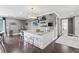 Modern wet bar with granite countertop and stylish barstools at 8414 Dunham Station Dr, Tampa, FL 33647