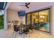 Outdoor kitchen and dining area with modern appliances at 8414 Dunham Station Dr, Tampa, FL 33647
