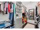 Large walk-in closet with ample shelving and hanging space at 8414 Dunham Station Dr, Tampa, FL 33647