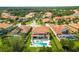Luxury home with pool and spa, surrounded by other homes at 8414 Dunham Station Dr, Tampa, FL 33647