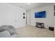 Game room features a large TV, comfortable seating, and ample space at 8414 Dunham Station Dr, Tampa, FL 33647