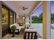 Evening view of covered patio with comfortable seating at 8414 Dunham Station Dr, Tampa, FL 33647