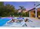Luxury pool and spa with fire pit and outdoor seating at 8414 Dunham Station Dr, Tampa, FL 33647