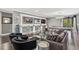 Game room with pool table, large screen TVs, and comfortable seating at 8414 Dunham Station Dr, Tampa, FL 33647