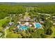 Aerial view of community amenities including pools and clubhouse at 8414 Dunham Station Dr, Tampa, FL 33647