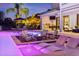 Inviting pool and spa with fire pit and lounge seating at 8414 Dunham Station Dr, Tampa, FL 33647