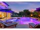 Stunning pool with water features and lounge chairs at 8414 Dunham Station Dr, Tampa, FL 33647