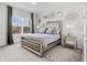 Spacious bedroom with large window and plush bed at 8414 Dunham Station Dr, Tampa, FL 33647