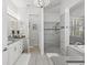 Spa-like bathroom featuring a walk-in shower and soaking tub at 8414 Dunham Station Dr, Tampa, FL 33647