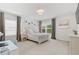 Charming bedroom with window and light decor at 8414 Dunham Station Dr, Tampa, FL 33647