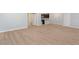 Bright living room with kitchen and bathroom views at 7779 Yale Harbor Dr, Wesley Chapel, FL 33545